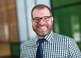 Named College's 13th Dean