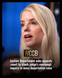 The Justice Department has asked an appeals court to block a contempt  investigation of the Trump administration for failing to turn around planes  carrying Venezuelan migrants to El Salvador in March.