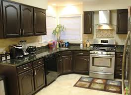 Painting kitchen cabinets can update your kitchen without the cost or challenge of a major remodel. Designer Painted Kitchen Cabinets