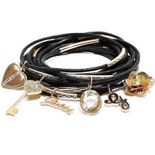 Black And Gold Bracelet Guess Black And Gold Tone Multi Cord Charm Bracelet Found On Polyvore Black Gold Jewelry Black Bangle Gold Charm Bracelet