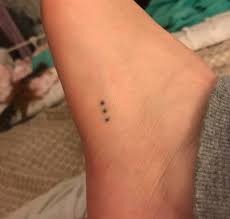 Two small flowers on an ankle tattoo. 67 Of The Tiniest Most Tasteful Tattoos Ever