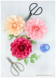 Made with eight small cupcake liners each, pipe cleaners and floral tape. How To Make Small Paper Roses Camellia Rose Template Tutorial