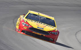 Who became the first driver to win the pole for the cup race on friday, win the busch series race on saturday and win the cup race on sunday? Joey Logano And Ford Win Pole For Michigan Nascar Sprint Cup Race
