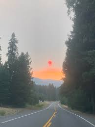 — california's largest wildfire has leveled much of the downtown and some surrounding homes in a small northern california mountain community. Sunset Just About To Drive Through Greenville Ca Fires To North East And Fires To The South East Firefighting