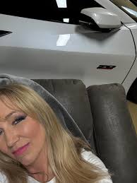 Admiring a Corvette in Oklahoma's beautiful weather