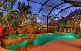 The lights in the wood ceiling emphasize the straight percentage of the pool. Swimming Pool Shapes Design Ideas Designing Idea