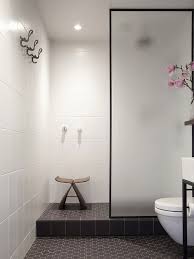 It features a durable white finish and satin nickel hardware. Architect Profile Bureaux Urbis Magazine Bathroom Glass Wall Glass Bathroom Bathroom Remodel Shower