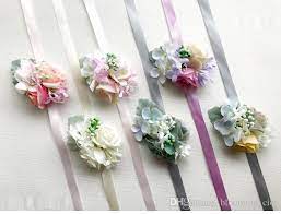 We've even seen weddings with make your own corsage bars where every guest can create her own corsage (or boutonniere for the guys). Groom Bridal Bridesmaid Wrist Corsage Wedding Flowers Forest Wedding Party Supplies Guest From Blooming Cici 16 09 Dhgate Com