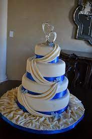 Ivory And Royal Blue Wedding Cake By Lily S Cakes Via Flickr Royal Blue Wedding Cakes Wedding Cakes Blue Cake