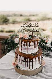 This Intimate 45 Person Capaldi Hotel Wedding In Marrakech Was Full Of Surprises From Start To Finish Junebug Weddings Orange Wedding Cake Winter Wedding Cake White And Gold Wedding Cake