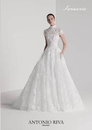 A sirena abiti da sposa con decorazione gioiello strascico di corte di pizzo manica lunga romantico traforato illusion sleeve con ricamo 2021. Vestiti Da Sposa Italiani
