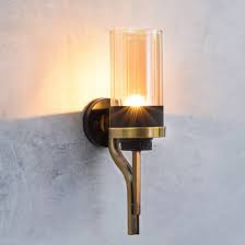 You're asking about:wall hanging lamp. Wall Lights Buy Decorative Wall Lights Online For Your Home Urban Ladder