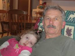 The love of my life, Jarvis, and the sunshine in both of our lives, our  granddaughter Lila Lynn. She's four, an old soul and very intelligent.  She's having a very difficult time