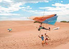 This unit is fully furnished and ready for you to move in or start. Hang Glide Over Sand Dunes In The Outer Banks