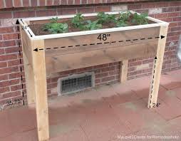 Align the slats to the top of the posts and align the edges flush. Remodelaholic Build An Elevated Planter Box And Save Your Back
