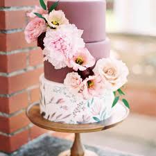 It serves as a stunning backdrop for different textures and colors. 24 Colorful Wedding Cakes That Are Almost Too Pretty To Eat