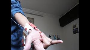 Take the huge rubber band, and hook it into the paper clip. Diy Paper Web Shooters Tutorial Youtube