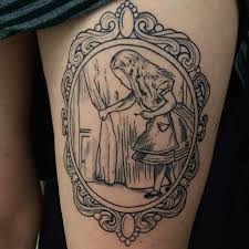 How to create an alice in wonderland themed stencil in adobe illustrator. My Alice In Wonderland Thigh Tattoo Just The Outline So Psyched About It Custom Victorian Inspired Fr Victorian Tattoo Victorian Frame Tattoos Framed Tattoo