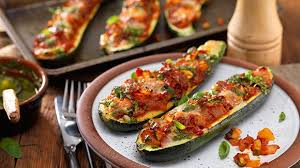 Stuffed Baby Marrow This Stuffed Baby Marrow Recipe Is A Great Meat Free Meal The Flesh Is Scooped Out And Cooked I Marrow Recipe Quick Supper Meals Recipes