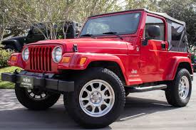 Image result for Flame Red 2005 Jeep