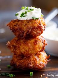 Tower Of Three Potato Latkes Topped With Sour Cream And Chives Latkes Recipes Potato Latkes Cooking Recipes