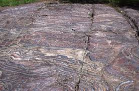 File:Glacially eroded jaspilite banded iron formation outcrop (Soudan Iron-Formation, Neoarchean, ~2.69 Ga; Stuntz Bay Road outcrop, Soudan Underground State Park, Soudan, Minnesota, USA) 3 (19038451429).jpg - Wikimedia Commons