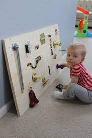 Weekend Diy Project Make A Toddler Activity Board Toddler Activity Board Baby Activity Board Busy Board Baby
