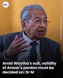 Former premier Dr Mahathir Mohamad is again casting doubt over the validity  of the royal pardon to Anwar Ibrahim, despite signing off