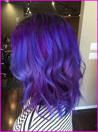 50 Blue Hair Color Ideas Thanks To The Rainbow Hair Trend A Growing Number Of Women Are Dyeing Their Locks Purple Hair Balayage Hair Purple Hair Color Purple