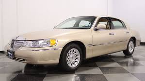 Image result for Dark Cordovan 1998 Town Car