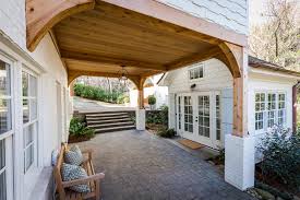 Since we bought the house, we always thought the side door entrance needed an overhang. Porte Cochere Offers Covered Access To Side Entrance Of French Country Style Home Hgtv