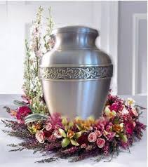 J shares the secret for using less flowers and creating a huge arrangement in a wreath ring. 64 Urn Floral Arrangements Ideas Floral Arrangements Urn Arrangements Funeral Flowers