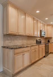 Merillat Classic Seneca Ridge Maple Cabinetry With All The Extras Full Width Roll Out Tray Maple Kitchen Cabinets Kitchen Remodel Black Granite Countertops