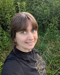 enjoying an overgrown field with tall weeds