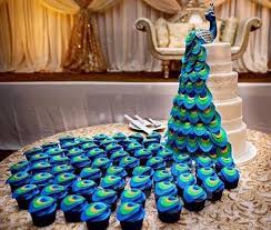 19 Vibrant Peacock Wedding Ideas Worth Trying Weddinginclude Peacock Wedding Cake Peacock Cake Themed Wedding Cakes