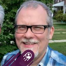 What are some free music sites or playlists for aquatic fitness classes?