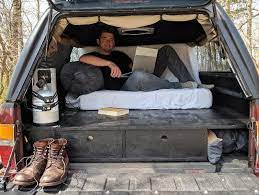 Camping in the back of a pickup truck. The Best Truck Bed Mattress For Truck Camping Take The Truck