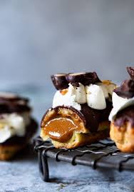 Caramel Crunch Eclairs Bakers Royale Desserts Eclair Recipe Chocolate Eclair Eclair Recipe Desserts Chocolate Eclair