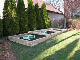 Building A Tiered Raised Bed Garden On A Slope Sloped Garden Building A Raised Garden Tiered Garden