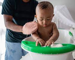 If you're quick and thorough with diaper changes and burp cloths, you're already cleaning the parts that need attention — the face, neck and diaper area. Bathing Baby