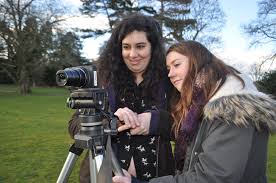 Helena Proctor and Marie Blowers filming rabbits - Reaseheath College