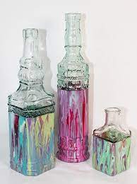 Vintage Poured Paint Glass Bottles Project By Decoart Painted Glass Bottles Bottle Painting Glass Bottle Diy