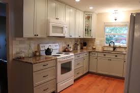 Shaker Style Limestone Color Kitchen Cabinets With Granite Counter Top Kitchen Cabinet Colors Beautiful Kitchens Kitchen Remodel