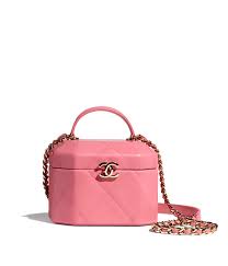 Also written in gold sharpie: Small Vanity Case Lambskin Gold Metal Chanel
