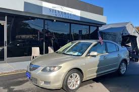 Image result for Shimmering Sand 2007 Mazda3