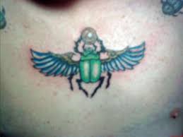 Scarab Winged Beetle Tattoo On Man Chest Get Free Tattoo Design Ideas Check out our winged scarab beetle selection for the very best in unique or custom, handmade pieces from our pendants shops. scarab winged beetle tattoo on man