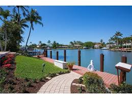 419 Mooring Line Dr Naples Fl 34102 Life On The Water In Naples Jet Skis And A Boat On Your Private Doc Waterfront Homes Real Estate Website Private Dock