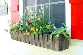Wooden window box with black semigloss finish. 50 Window Box Design Ideas To Add More Life And Color To Your Home S Exterior Home Improvement Cents