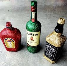 Glitter Alcohol Bottles All You Need Is Modge Podge Paintbrush Glitter And There You Go Liquor Bottle Crafts Decorated Liquor Bottles Alcohol Bottles