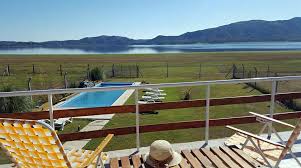 La propiedad posee una espectacular vista al lago y un amplio parque rodeando la misma. Cabanas Costa Paraiso Alojamientos En Potrero De Garay Cordoba Valle De Paravachasca Listado Completo Cabanas Departamentos Hosterias Y Posadas Apart Hotel